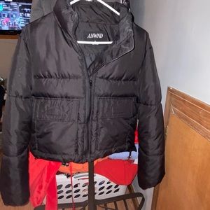 Puffer Jacket from ANWND, in the size M & in the color Black.